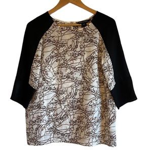 French Connection 100% silk blouse. 3/4 sleeve scoop neck size 8 Like new.